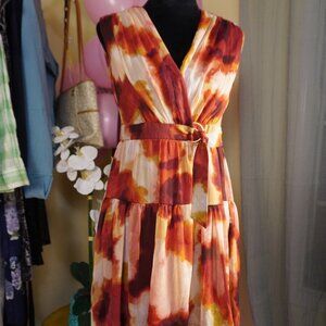 Taylor's printed dress makes an impression with a sophistcated silhouette